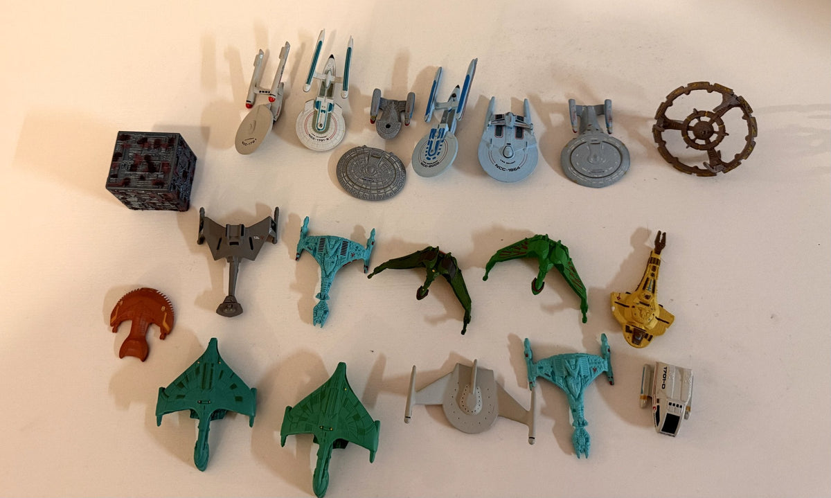 Second angle of the Star Trek Micro Machines lot showing the Borg cube and station pieces