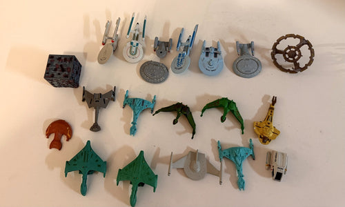 Second angle of the Star Trek Micro Machines lot showing the Borg cube and station pieces