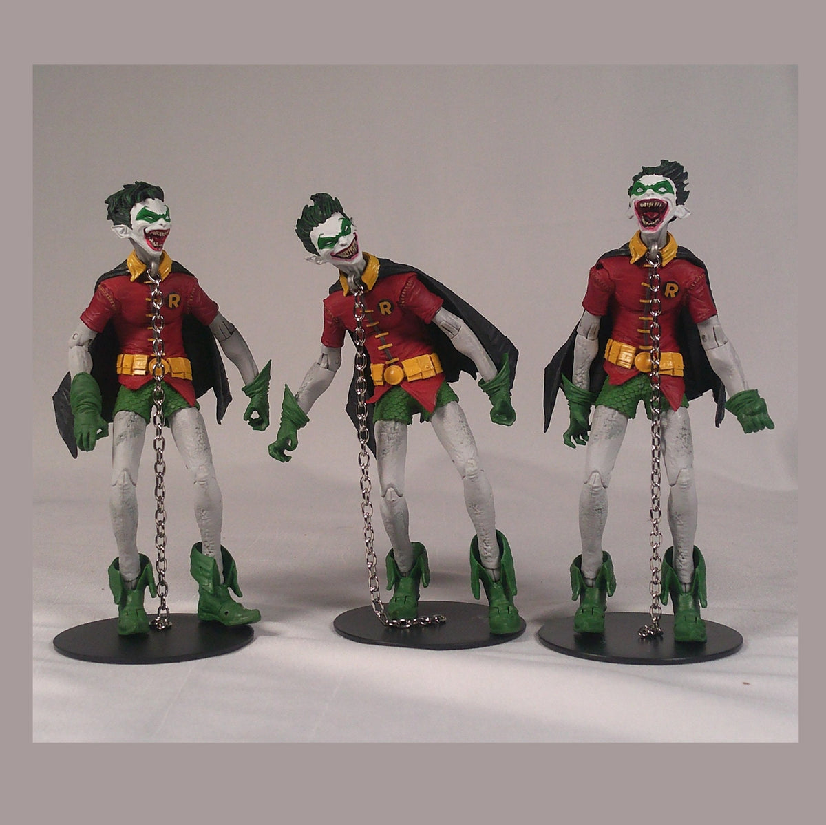 All three Rabid Robins of Earth-22 with their chains and stands