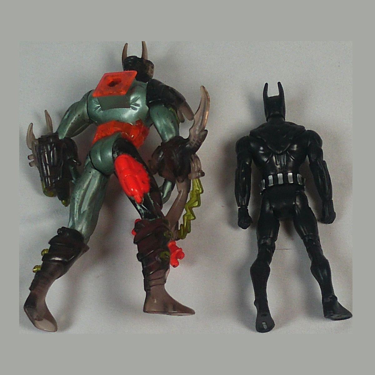 Two Batman Beyond figures including Terry McGinnis in the black suit