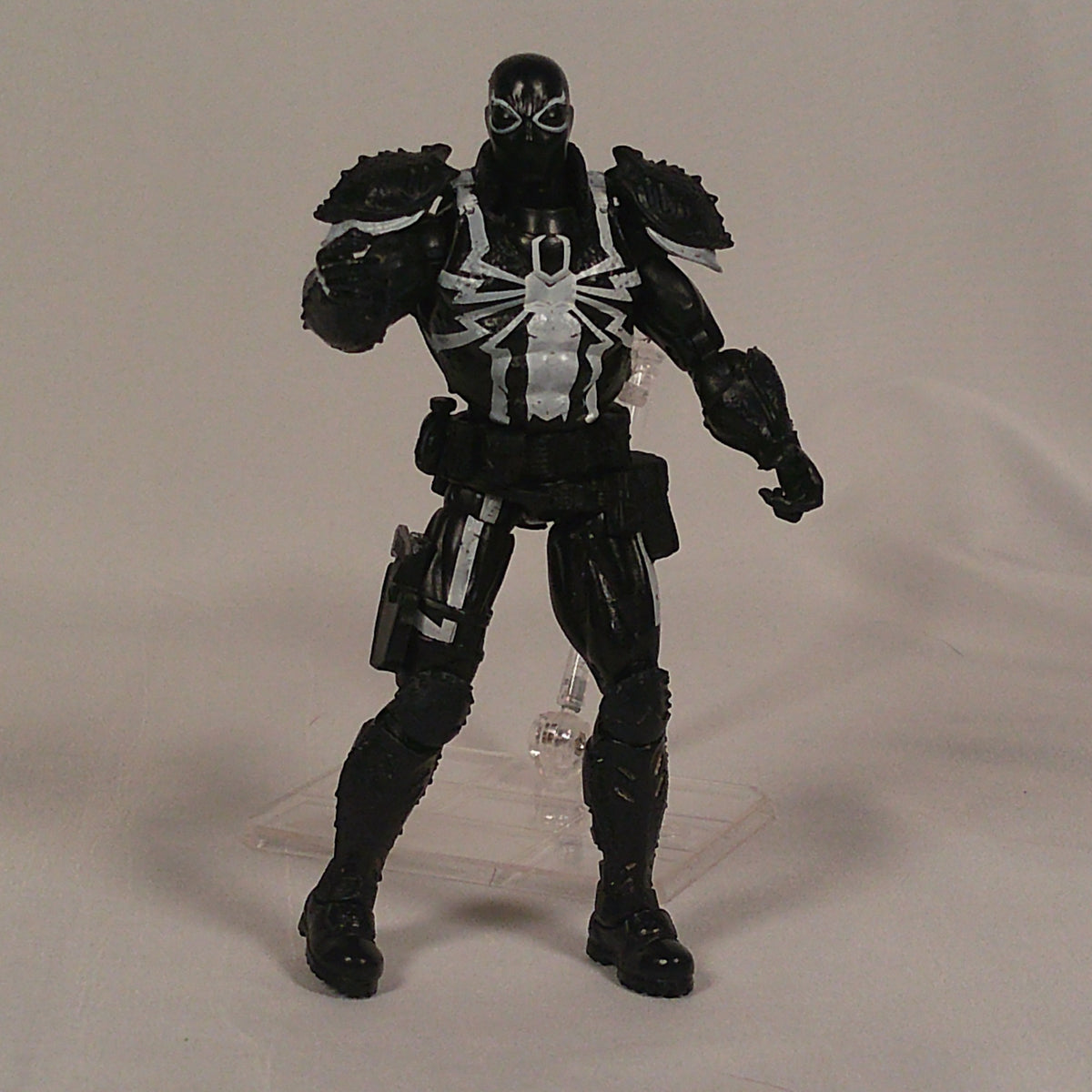 Agent Venom figure, side view showing holster and thigh pouches