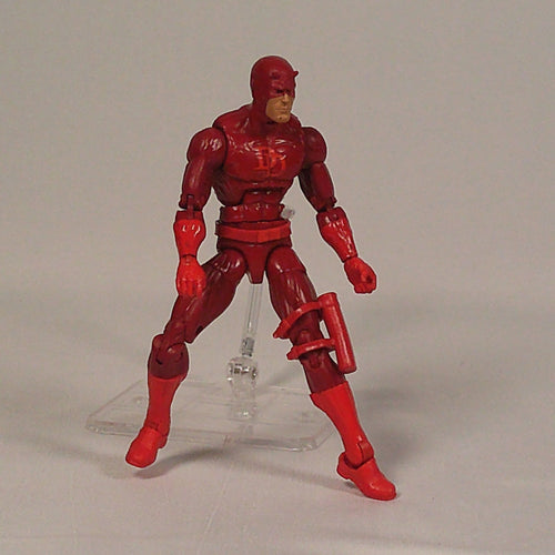 Daredevil figure, angled view showing DD chest logo