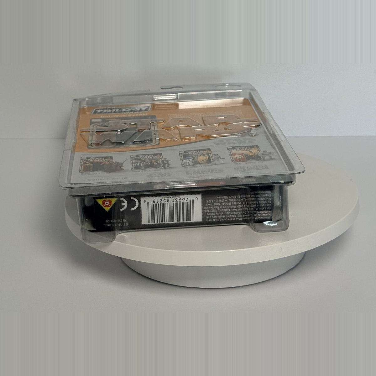 Angled view showing the clamshell protector and card corners