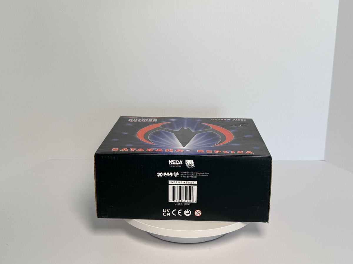 Box underside showing NECA Reel Toys markings and product code