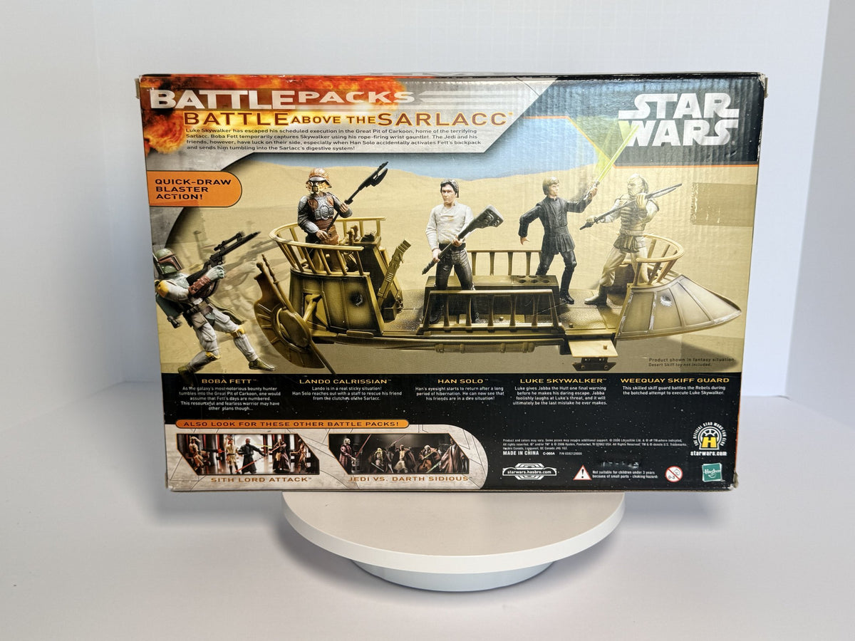 Box back listing Boba Fett, Lando, Han, Luke and Weequay Skiff Guard